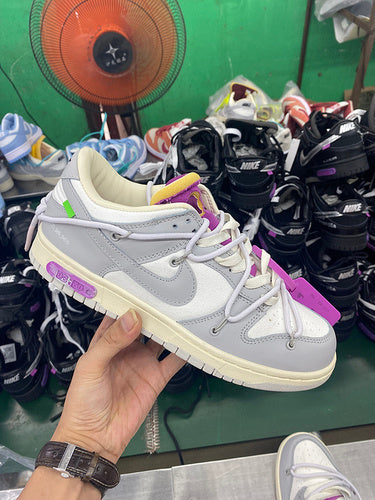 Nike Designer sneakers in bold contrast signature lace-up style front view