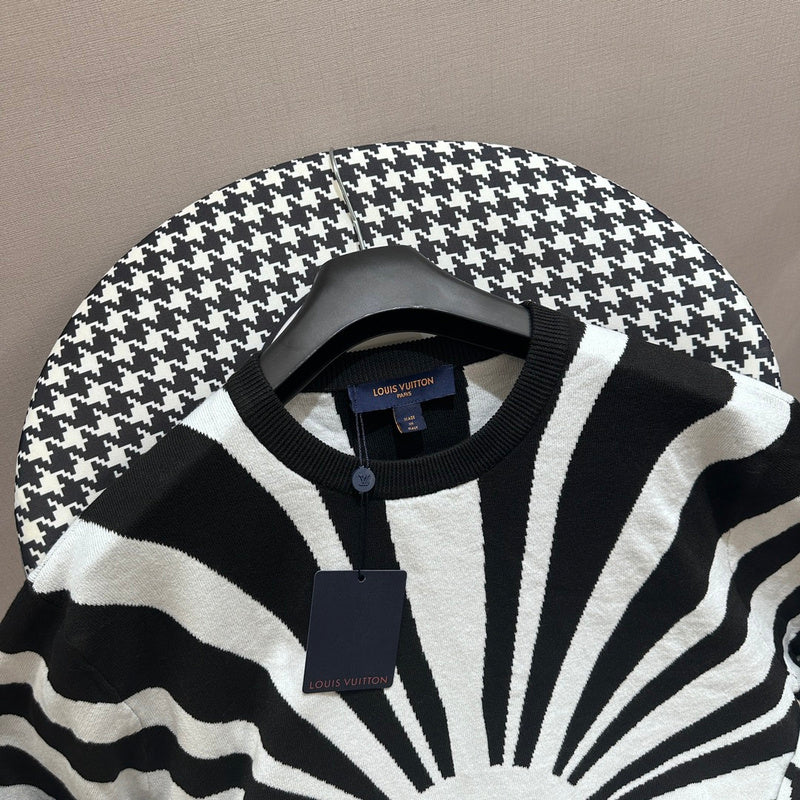 Close-up detail shot of Louis Vuitton luxury clothing with runway-inspired design