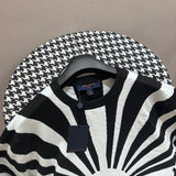Close-up detail shot of Louis Vuitton luxury clothing with runway-inspired design