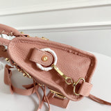 Zivas Charm Polished Finish Statement Handbag (Signature Shape & Finish) – Styled Look