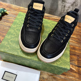 Side profile of Gucci tonal black sneakers premium leather build