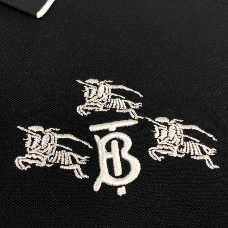 Flat lay presentation of Polo cotton polo shirt with monogram-inspired silhouette