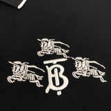 Flat lay presentation of Polo cotton polo shirt with monogram-inspired silhouette