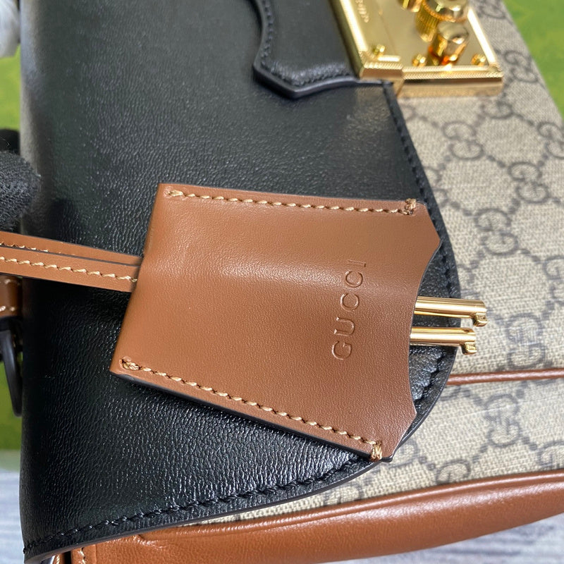 Styled lifestyle shot of chic refined women's handbag – women's luxury accessory