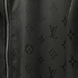 Flat lay presentation of Louis Vuitton luxury clothing with label-forward styling