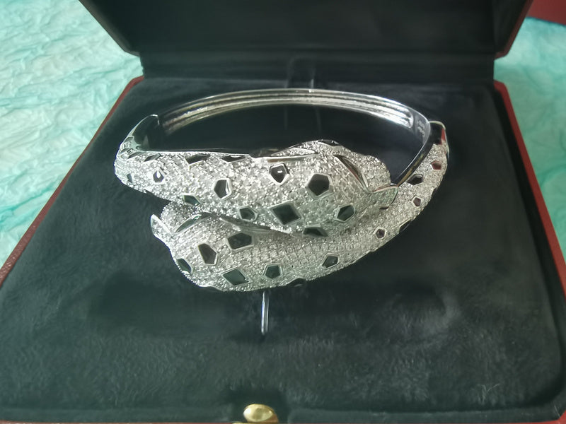 Side view of Cartier unisex jewelry piece