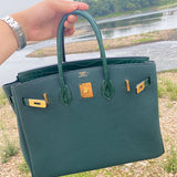  minimalist shoulder bag detail view showing craftsmanship