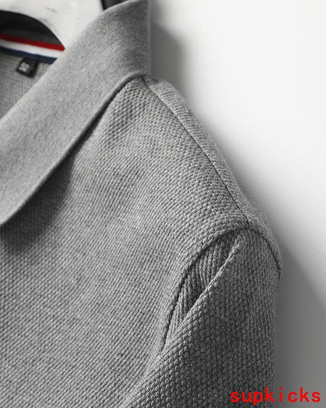 Back view of Moncler luxury clothing with contemporary cut