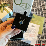 Lifestyle view of Van Cleef & Arpels unisex jewelry piece