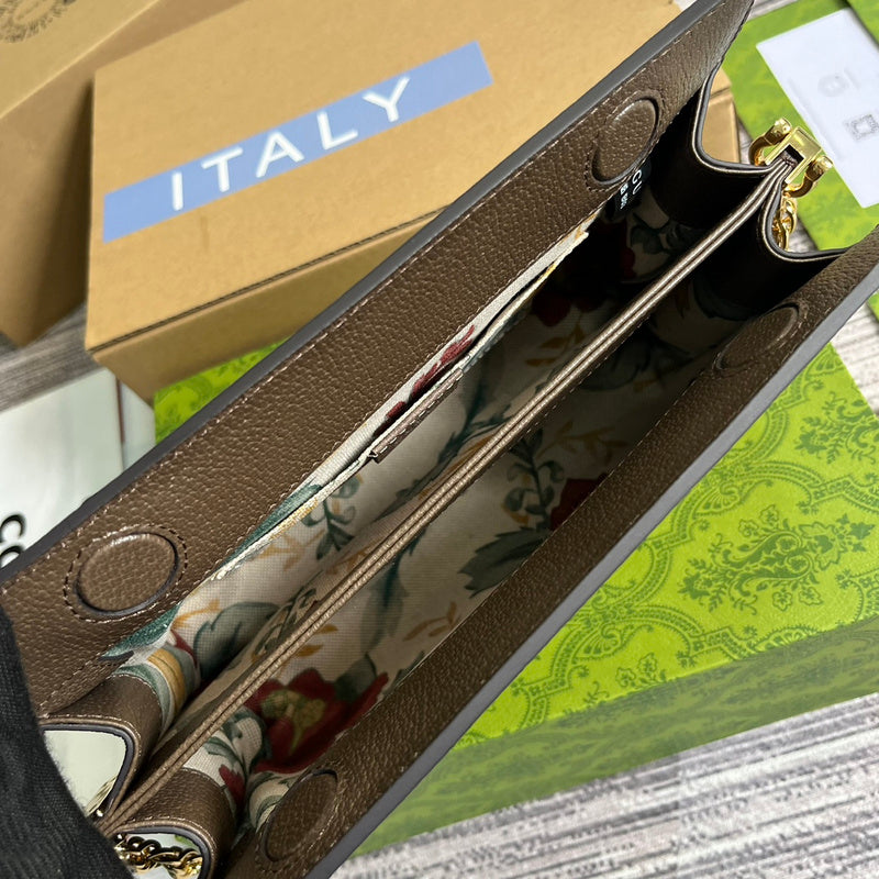 Close-up detail of signature structured women's handbag – women's designer-style accessory
