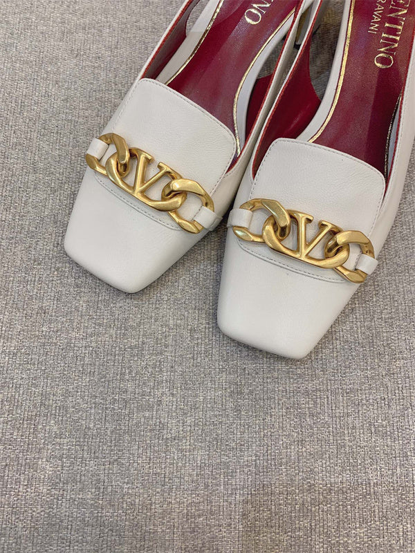 Full silhouette view of Valentino Garavani luxury piece style No.194