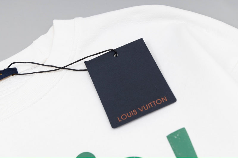 Flat lay presentation of Louis Vuitton luxury clothing with streetwear-inspired cut