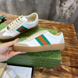 Side profile of Gucci bold contrast sneakers signature lace-up style