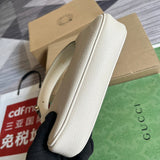Styled lifestyle shot of modern elevated women's handbag – women's luxury accessory