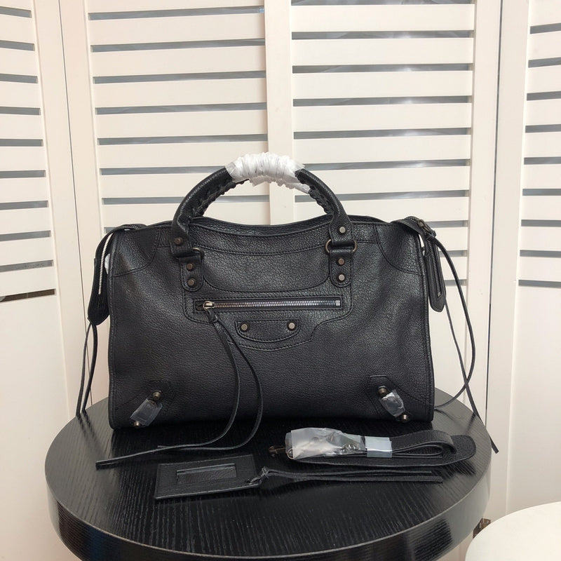 Front view of chic structured women's handbag – women's statement bag