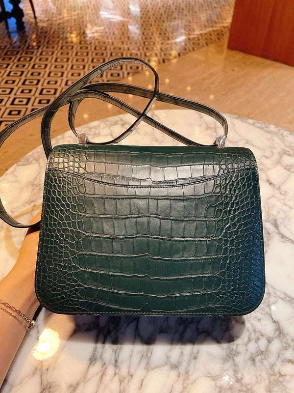 Side view of structured structured handbag