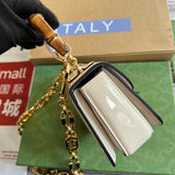 Side view of structured structured handbag