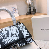 Ziva's Charm handbag – styled view (one versatile size)