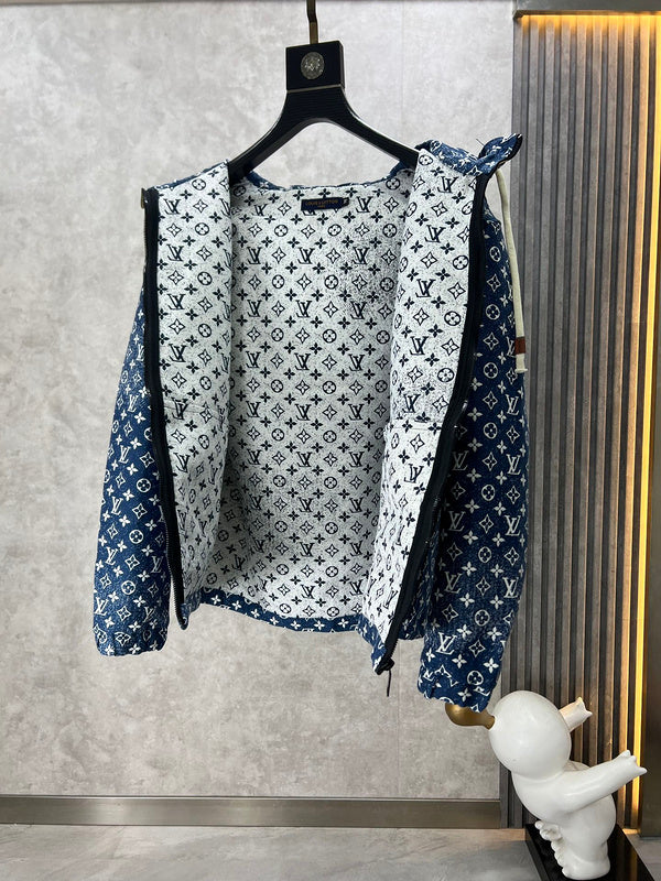 Close-up detail shot of Louis Vuitton luxury clothing with label-forward styling