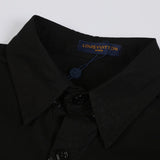Close-up detail shot of Louis Vuitton luxury clothing with monogram-inspired silhouette