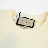 Close-up detail shot of Gucci luxury clothing with tailored silhouette
