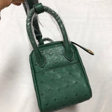 Side view of curated structured handbag