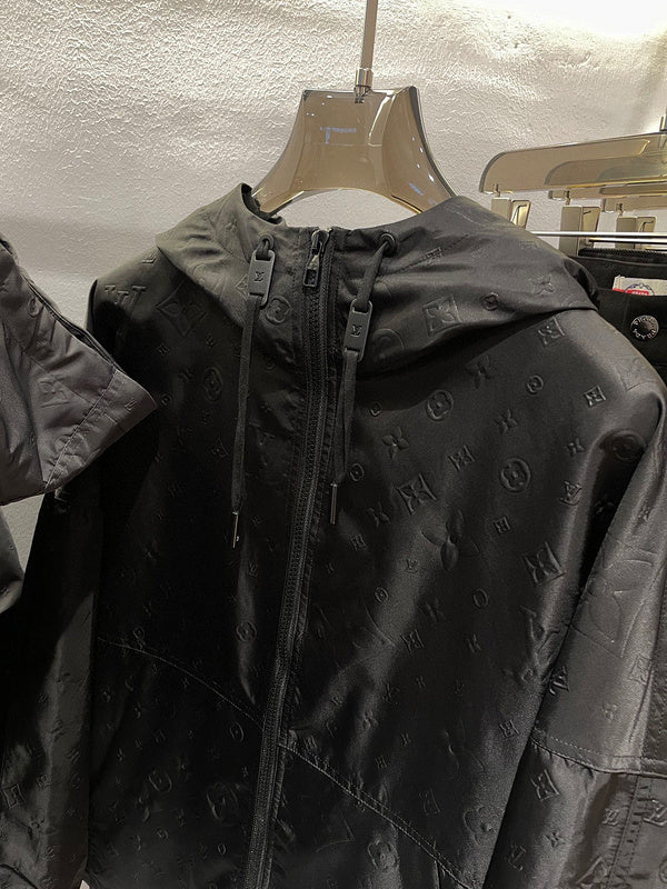 Flat lay presentation of Louis Vuitton luxury clothing with relaxed-fit cut
