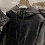 Flat lay presentation of Louis Vuitton luxury clothing with relaxed-fit cut