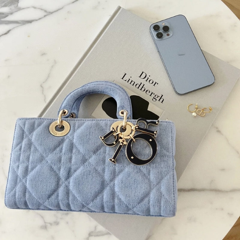 Handle and strap detail of refined elevated women's handbag – women's designer-style accessory