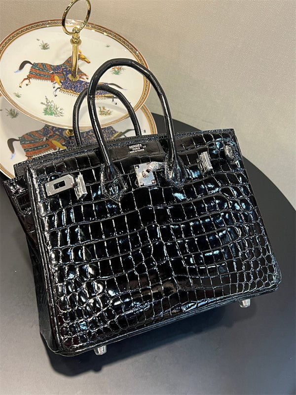 Side view of poised structured handbag