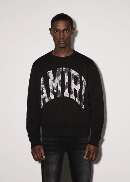 Close-up detail view of Amiri luxury piece style No.057