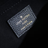 Close-up detail of signature sleek women's handbag – women's statement bag