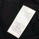Flat lay presentation of Louis Vuitton cotton t-shirt with monogram-inspired silhouette
