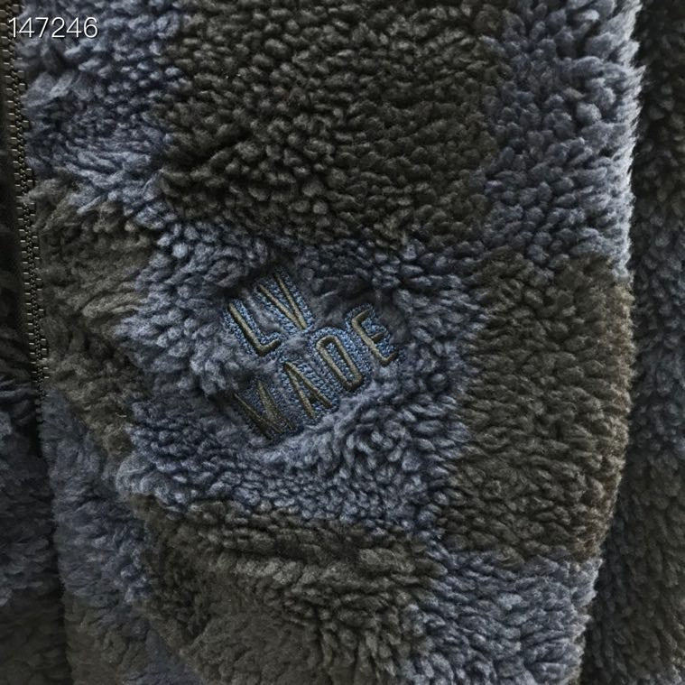 Full styled look of Louis Vuitton luxury clothing with signature branding
