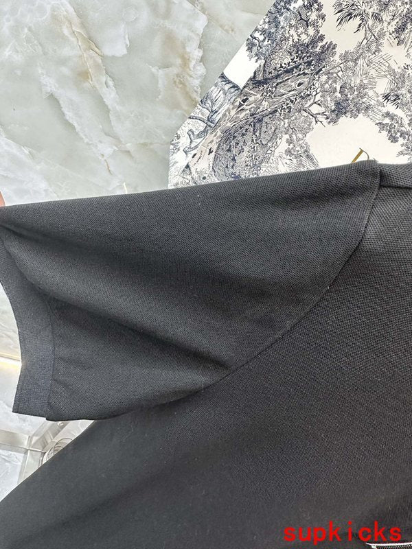 Close-up detail shot of Moncler luxury clothing with tailored silhouette