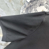 Close-up detail shot of Moncler luxury clothing with tailored silhouette