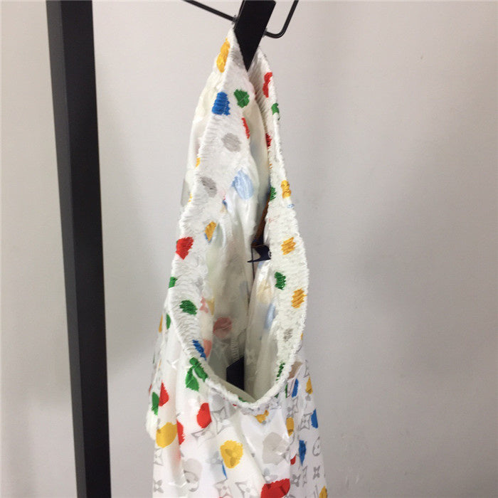 Flat lay presentation of Louis Vuitton cotton t-shirt with label-forward styling