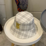 Side view of Burberry unisex cap