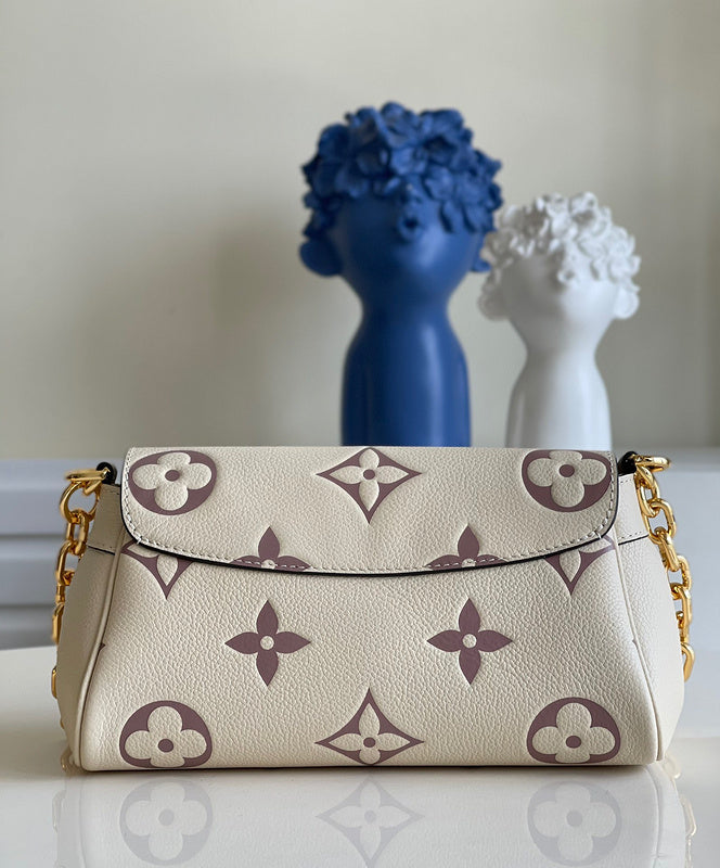 Styled lifestyle shot of premium refined women's handbag – women's luxury handbag