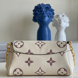 Styled lifestyle shot of premium refined women's handbag – women's luxury handbag