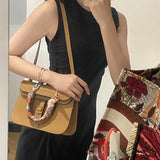 Streamlined shopper bag carried on shoulder 16