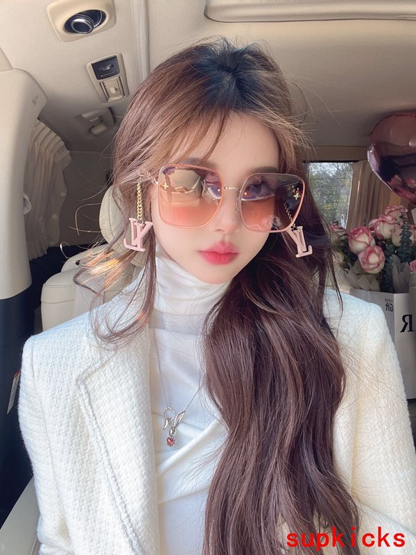 Lifestyle view of Louis Vuitton unisex sunglasses