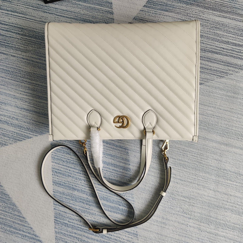 Front view of chic sleek women's handbag – women's statement bag