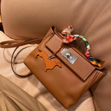 Side view of timeless structured handbag