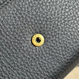 Close-up detail of sleek refined women's handbag – women's statement bag