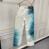 Side profile of Louis Vuitton luxury clothing with signature branding