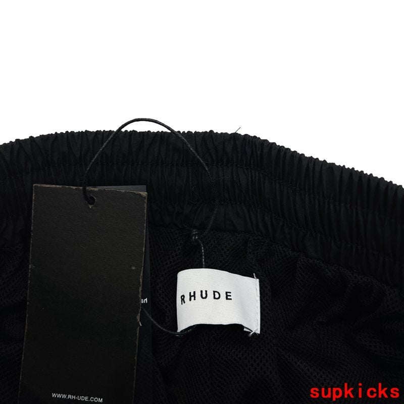 Flat lay presentation of Rhude luxury clothing with everyday silhouette