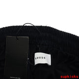 Flat lay presentation of Rhude luxury clothing with everyday silhouette