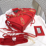 Back view of classic structured women's handbag – women's statement bag