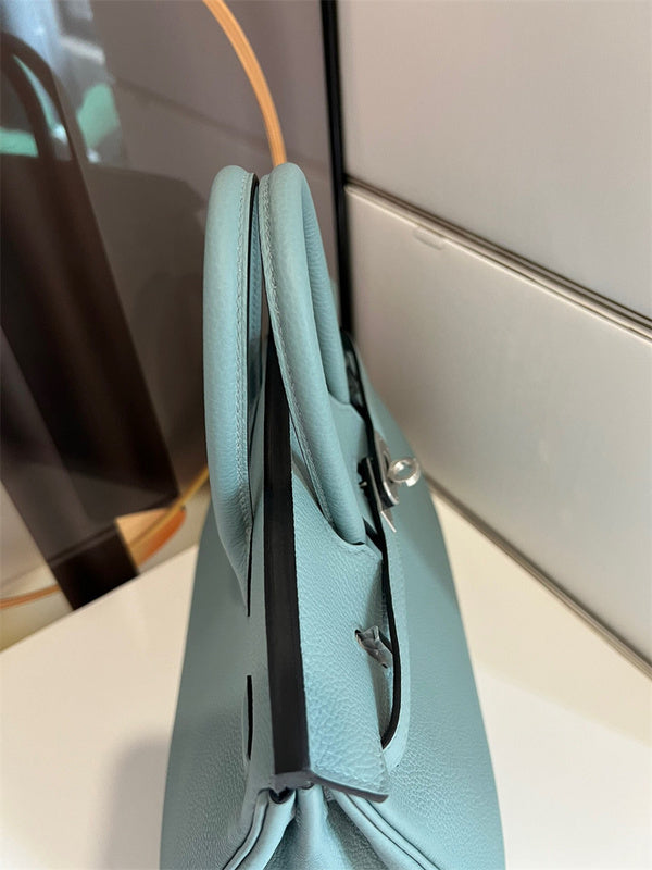  polished structured bag styled with outfit